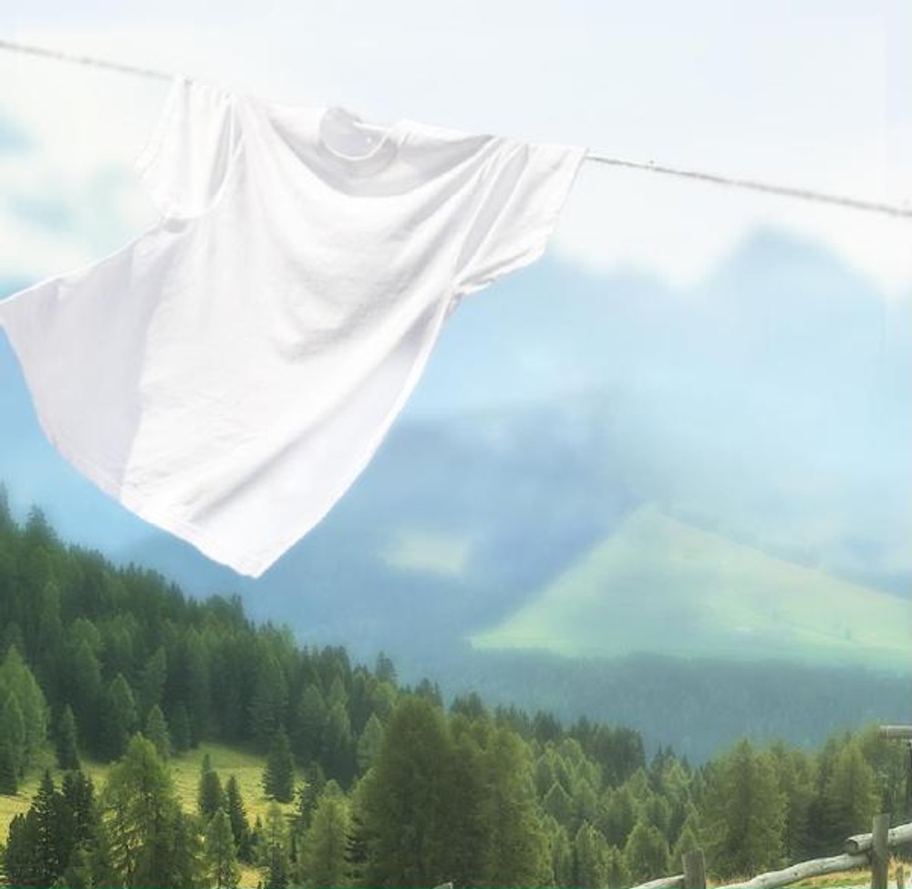 Clean white garment and Alpine landscape from the supplied Persil brand book